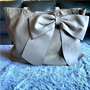Tan Karl Lagerfeld tote/ purse.
